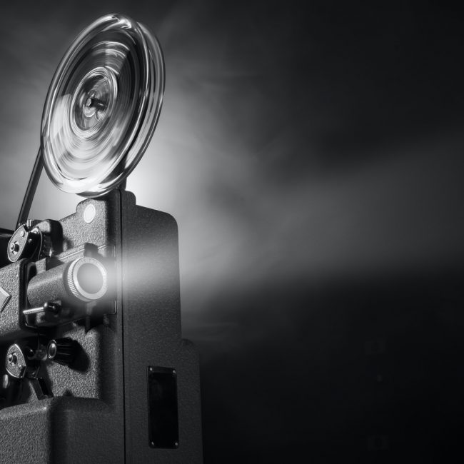 Vintage film projector and film screening